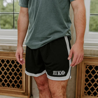 Pi Kappa Phi Fraternity Black 7" Mesh Shorts with Greek letters.