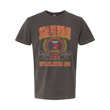 College-aged male wearing the fraternity Collegiate Crest Graphic Tee in charcoal grey, featuring vintage Sigma Phi Epsilon crest artwork on campus.