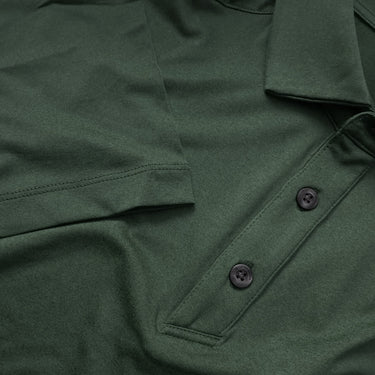 Close up image showing the green heathered Cutter & Buck polo