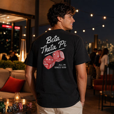 Comfort Colors High Roller Tee shown front and back, featuring a small dice graphic on the chest pocket and a large casino-inspired dice design on the back.