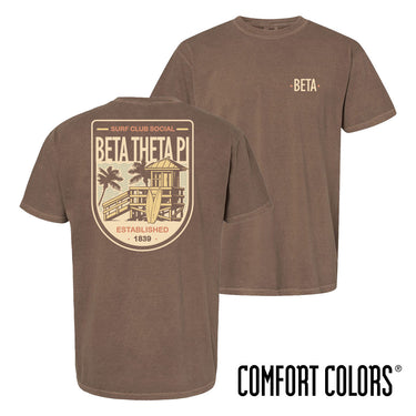 Brown Comfort Colors Surf Club Social T-shirt featuring a small front logo and a large surf club back graphic.