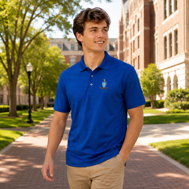 College student wearing fraternity polo embroidered with crest on left chest.