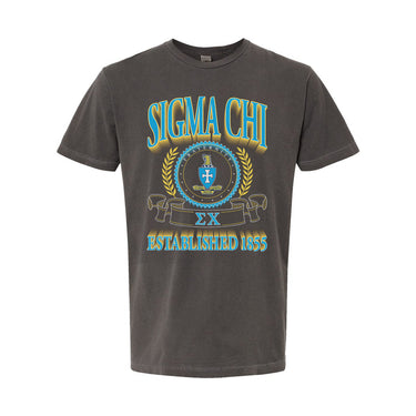 College-aged male wearing the fraternity Collegiate Crest Graphic Tee in charcoal grey, featuring vintage Sigma Chi crest artwork on campus.