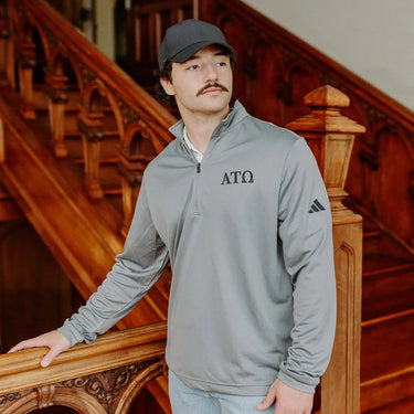Alpha Tau Omega Fraternity Grey Adidas Lightweight Performance 1/4 Zip with Greek letters.
