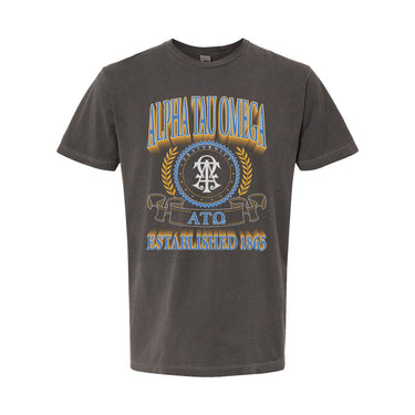College-aged male wearing the fraternity Collegiate Crest Graphic Tee in charcoal grey, featuring vintage Alpha Tau Omega crest artwork on campus.
