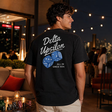 Comfort Colors High Roller Tee shown front and back, featuring a small dice graphic on the chest pocket and a large casino-inspired dice design on the back.