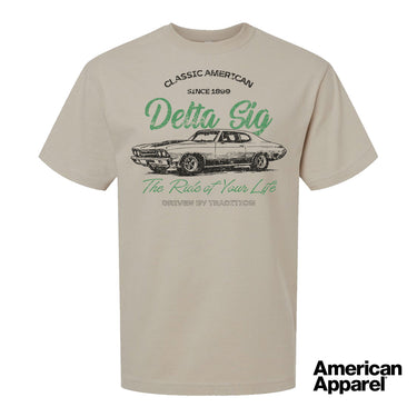 Beige T-shirt displayed on a plain background with a vintage-inspired graphic of a classic muscle car, mixed typography, and a soft red and black print design.